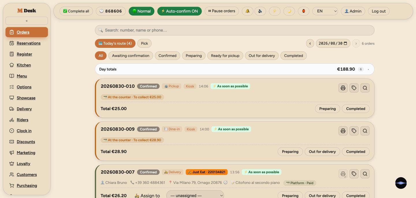 Order board with orders from the website, the kiosk and Just Eat side by side